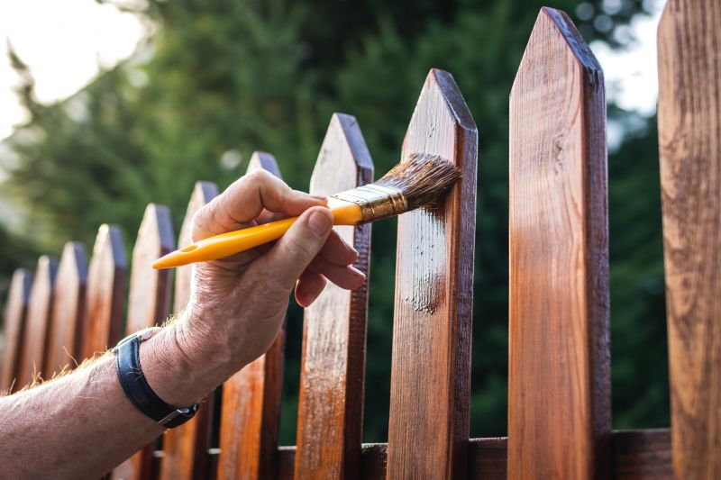 Staining Fence in Summer